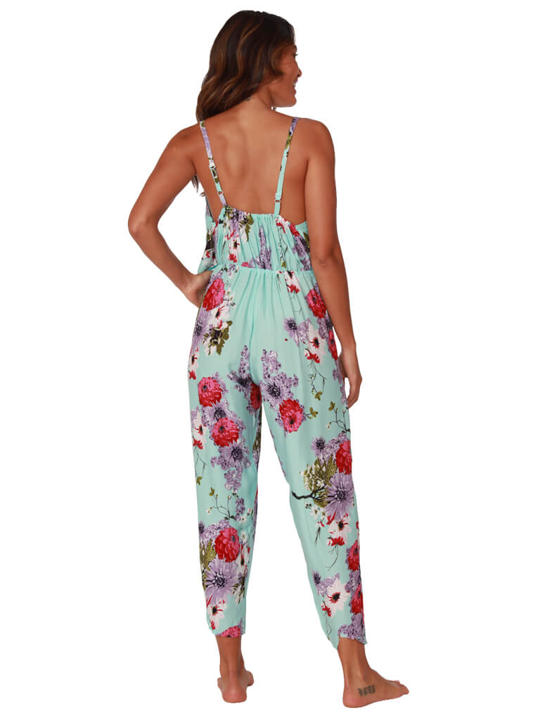 A bright floral print flounced top jumpsuit, back view