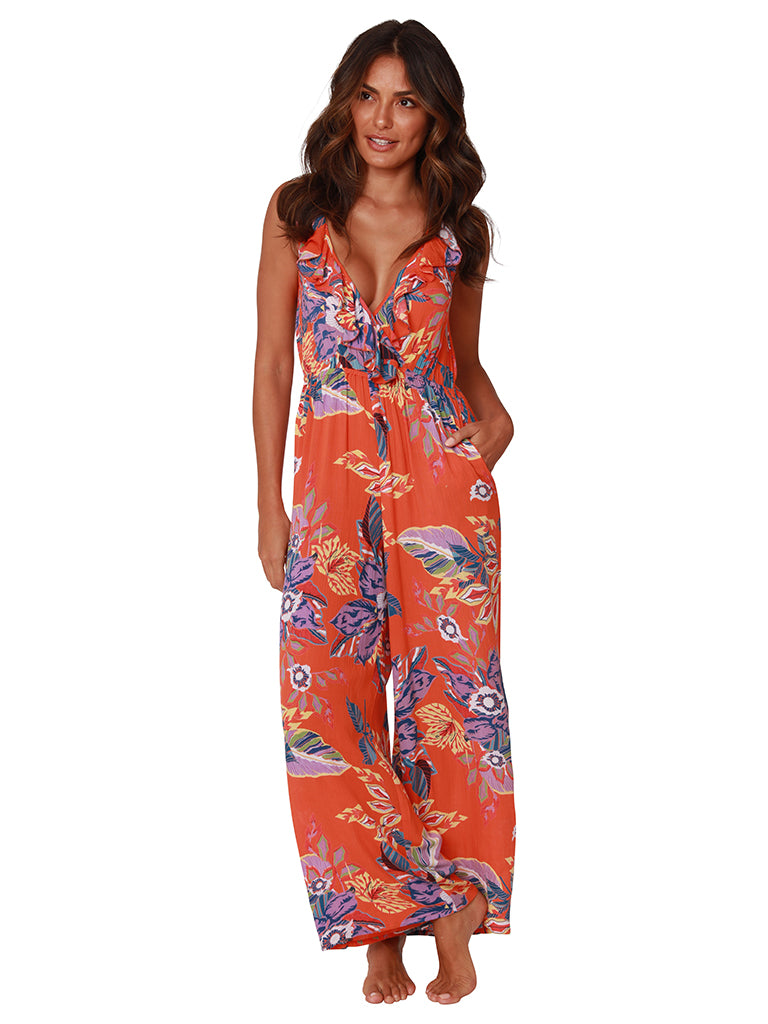 Floral print jumpsuit features a front ruffle, front view