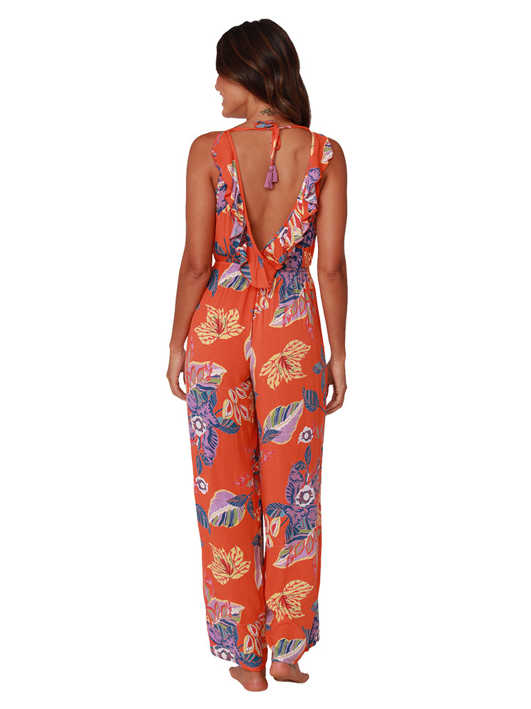 Floral print jumpsuit features a front and back ruffle, back view