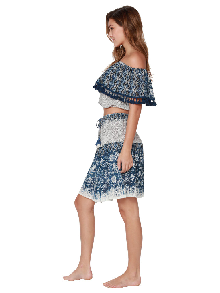 Paisley print skirt with a tasseled front tie, side view