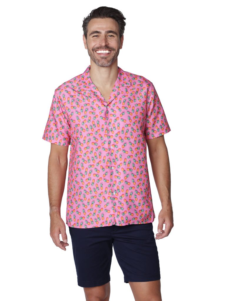 A random spray of miniature pineapples on a bright pink background, Hawaiian shirt