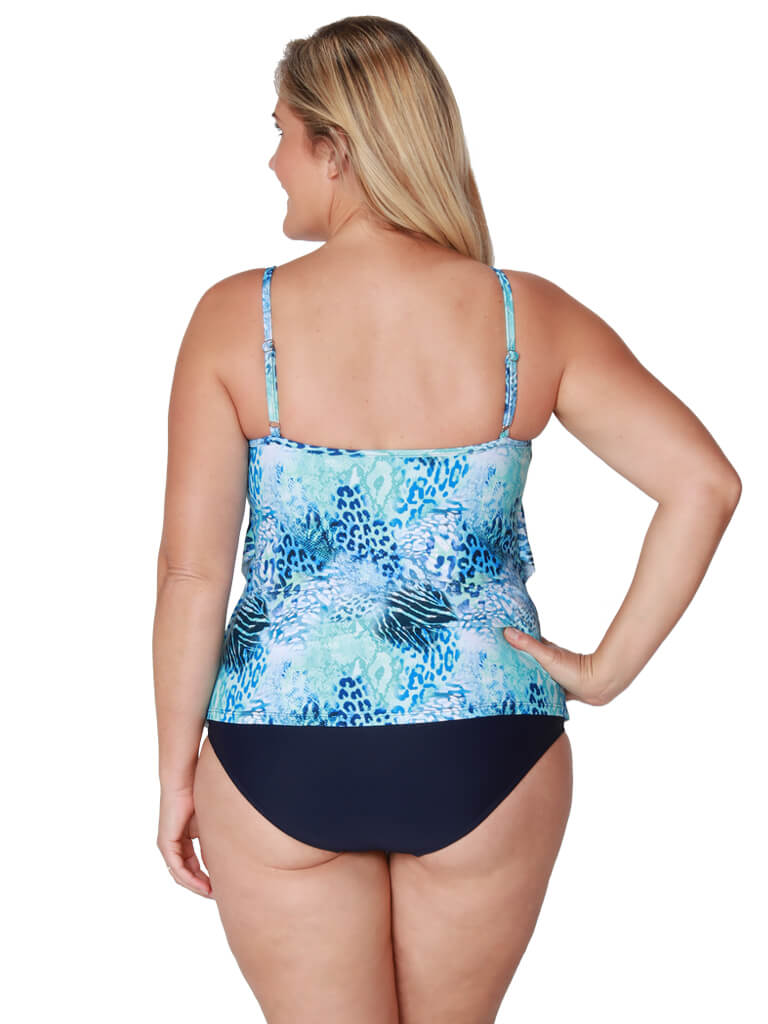 An stylized animal print in hues of blues, aqua and navy, back detail