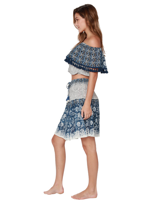 Paisley print skirt with a tasseled front tie, side view
