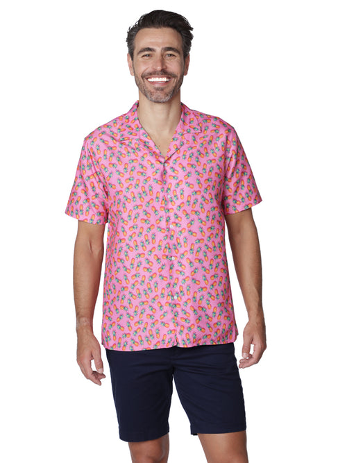 A random spray of miniature pineapples on a bright pink background, Hawaiian shirt 