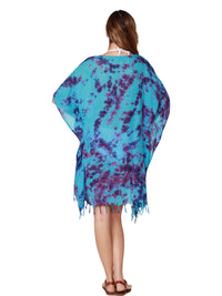 V-neck tie-dye poncho with fringe bottom, back view.